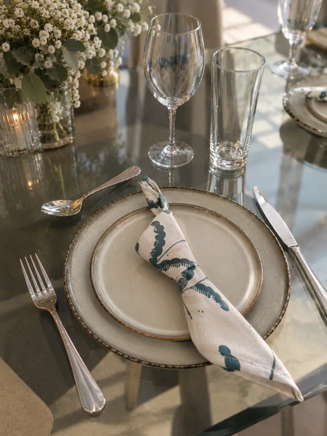 Green-themed place setting with coordinated table decor